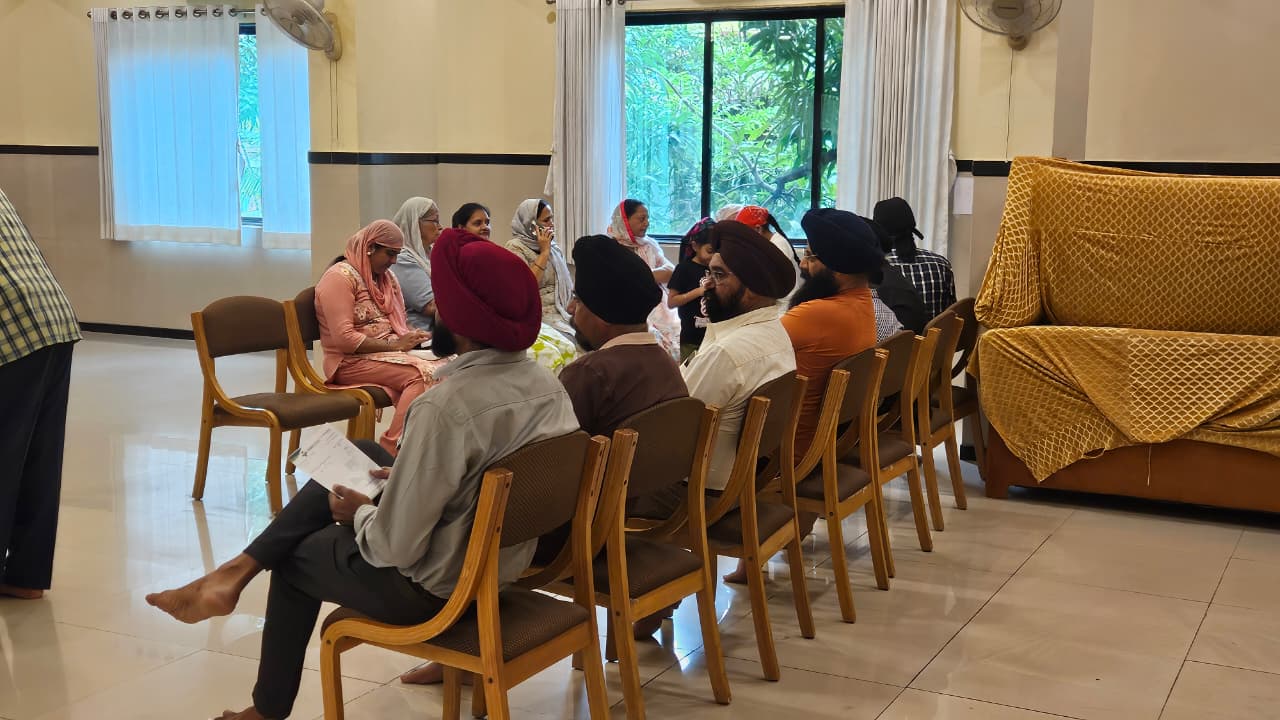 Attendees seated in the waiting area at the Health Checkup Camp in Vapi